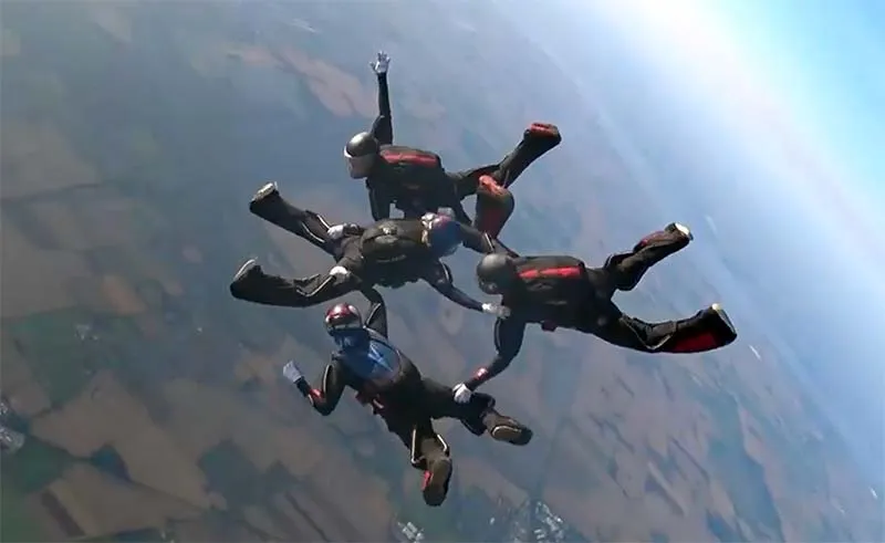 A four-way team links up in freefall